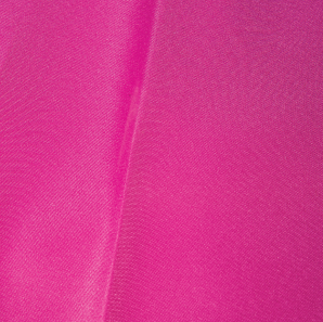 Close up of a hot pink polyester tablecloth