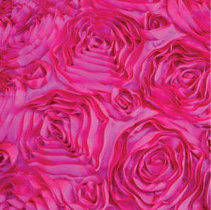 Close up of a hot pink rosette tablecloth.